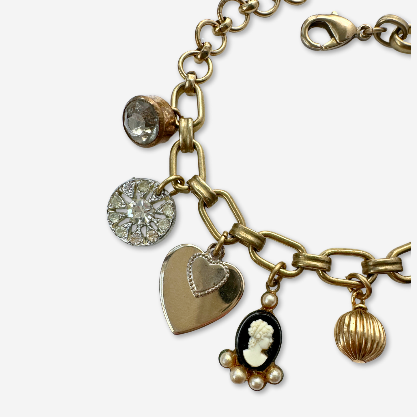 Repurposed vintage black and brass charm bracelet