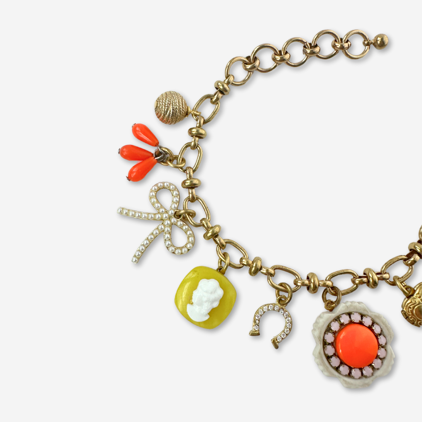 Repurposed vintage yellow, orange, and pink charm bracelet