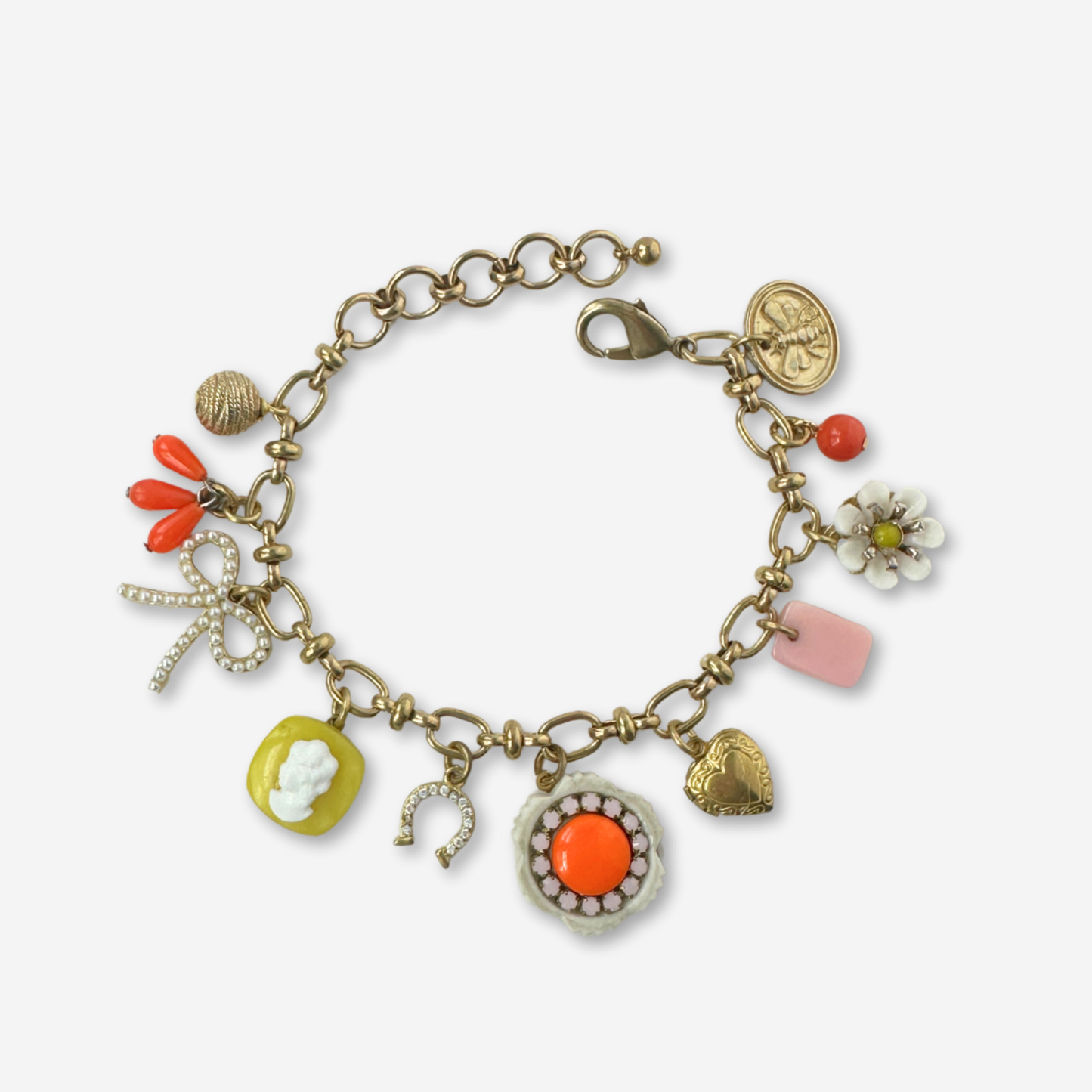 Repurposed vintage yellow, orange, and pink charm bracelet