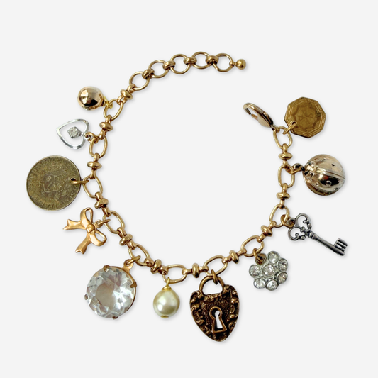 Repurposed vintage mixed neutral charm bracelet
