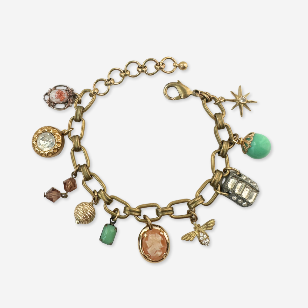 Repurposed vintage green and peach mixed charm bracelet