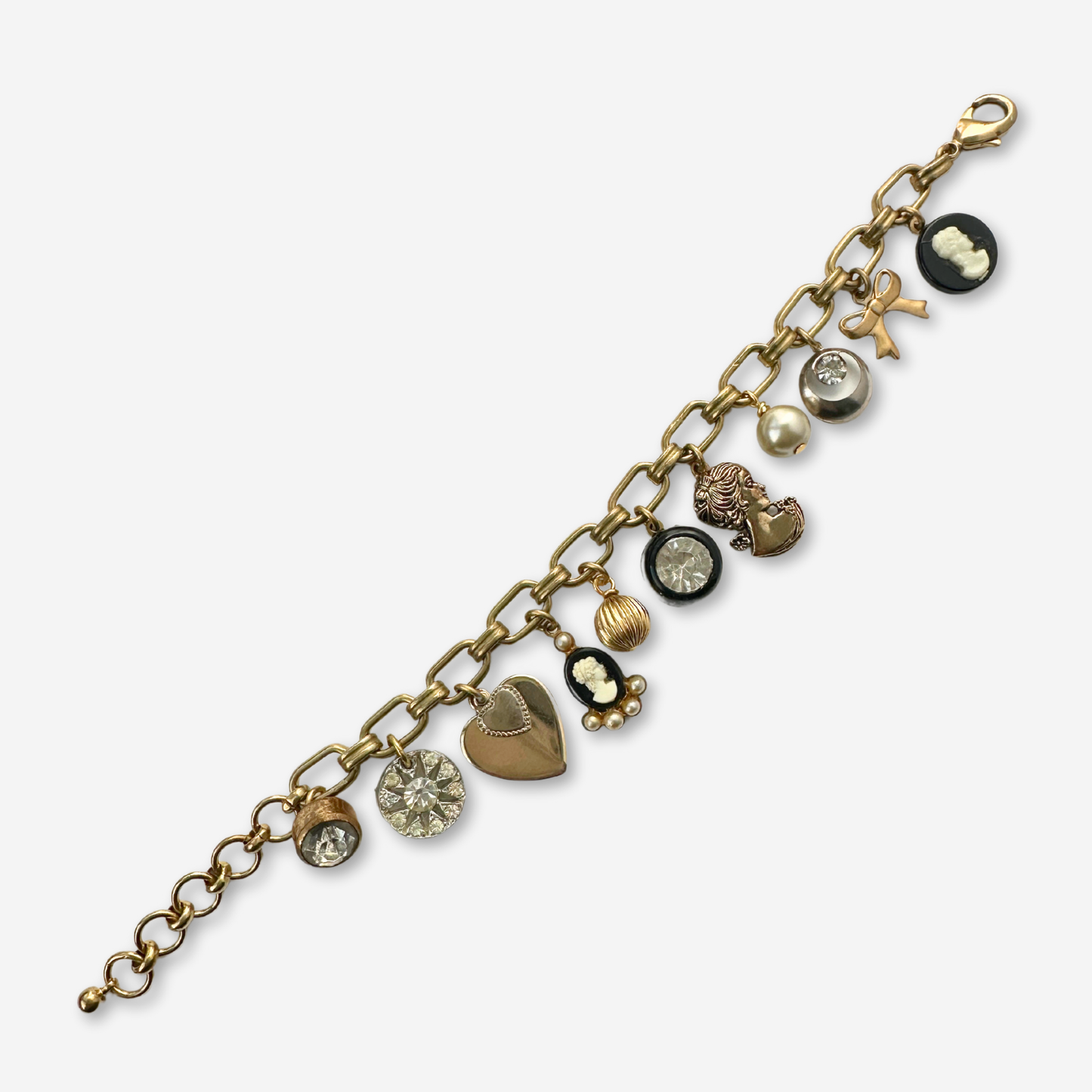 Repurposed vintage black and brass charm bracelet