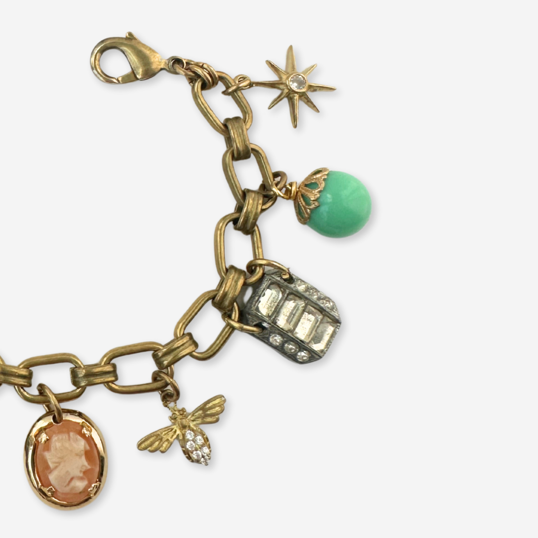 Repurposed vintage green and peach mixed charm bracelet
