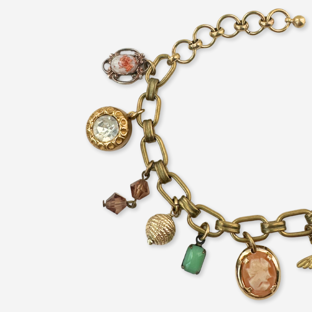Repurposed vintage green and peach mixed charm bracelet