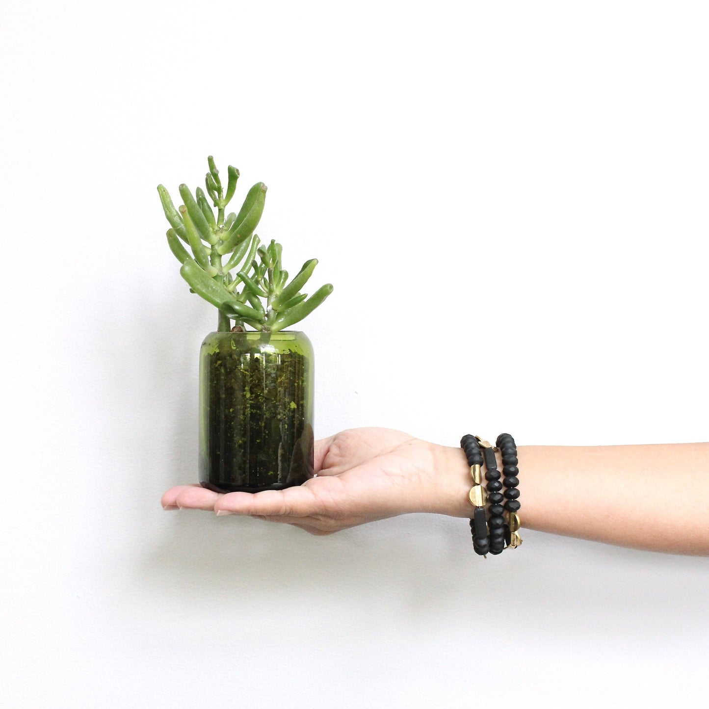 JLTB07 black and brass triple strand bracelet