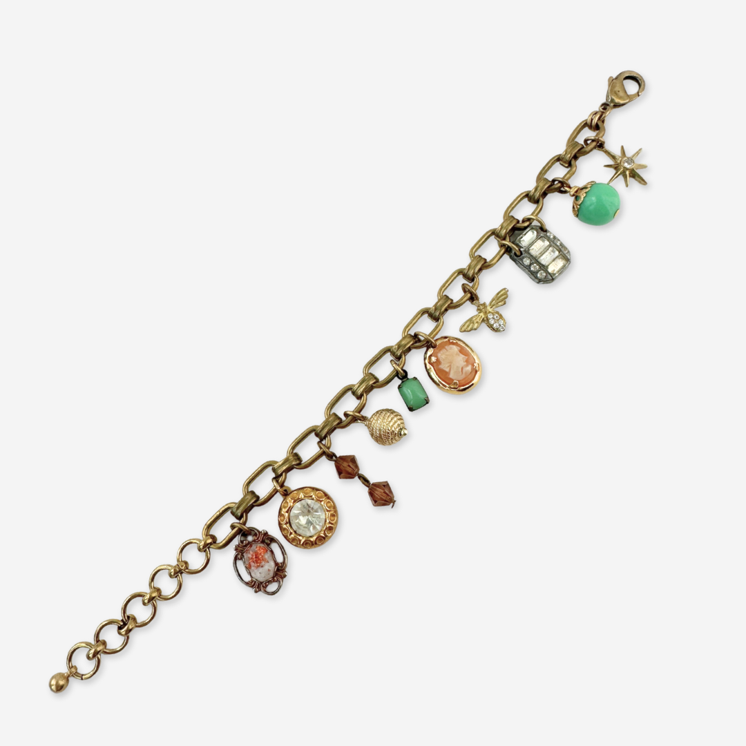 Repurposed vintage green and peach mixed charm bracelet